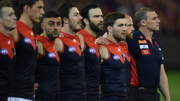 Melbourne coach Simon Goodwin and his players before Friday night’s semi-final.