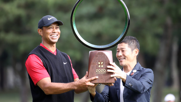 Tiger Woods prevailed in the first PGA Tour event staged in Japan.