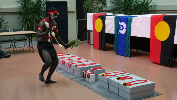 A Yawuru man performs at the repatriation ceremony at the Australian embassy in Berlin.