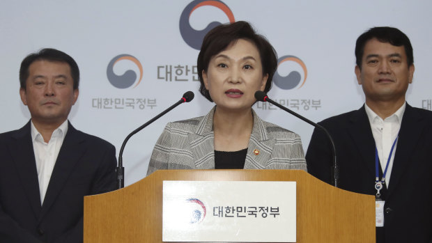 South Korean Minister of Land Infrastructure and Transport, Kim Hyun-mee, centre, speaks at a press conference in Seoul on Tuesday.