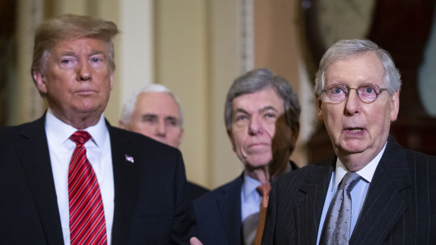 Senate Majority Leader Mitch McConnell, a Republican, on right, discouraged Republicans from voting on the bill.