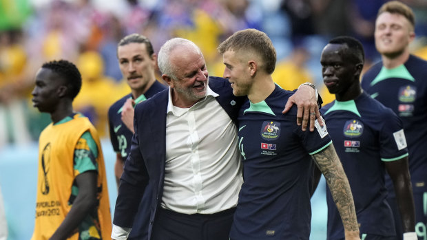 Graham Arnold and Riley McGree after the final whistle.