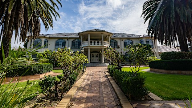 The Andrianakos family mansion sits on acreage in Greenvale.