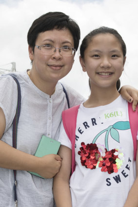 Natalie Li, right, with her mum Kitty, following the exams on Sunday.
