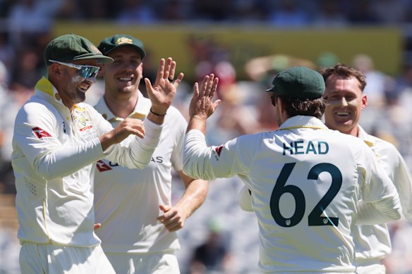 Australia’s Travis Head, second right, celebrates with teammates after the dismissal of South Africa’s Aiden Markram on day three.