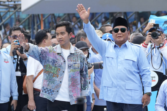 Presidential candidate Prabowo Subianto, right, and his running mate Gibran Rakabuming Raka, Joko Widodo’s son, at a rally in Jakarta on Saturday.