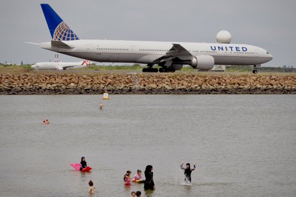 Children playing at Tower Beach in 2021. Recent Google reviews show children continue to splash in the water there despite swimming now being banned due to concerns about cancer-causing chemicals.  