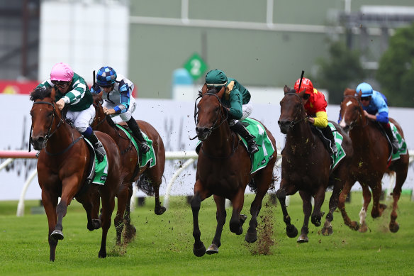 Straight Charge 
(pink cap)  holds off Espionage in the finish of the Silver Slipper.