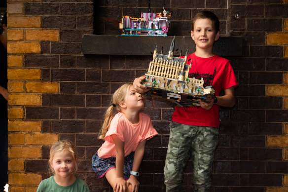 Seven-year-old William Grant and his twin sisters Maggie and Louisa, 6 have been playing with Lego. 