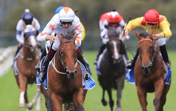Phoenix Thoroughbreds’ horse Farnan (white cap) wins the 2020 Golden Slipper.