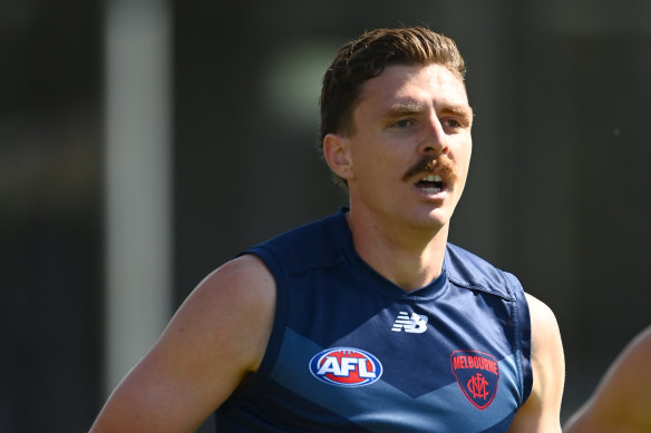 Jake Lever runs during preseason training.