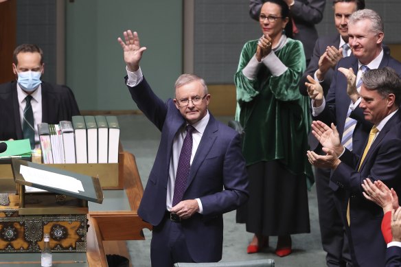 Opposition Leader Anthony Albanese is applauded by colleagues after delivering the budget reply in the House of Representatives on Thursday.