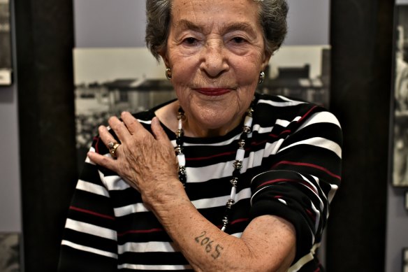 Auschwitz survivor Lotte Weiss shows her tattoo number in 2015, aged 91.