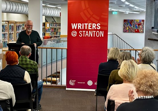 Bestselling crime author Michael Robotham addresses readers at an independent bookseller’s event.