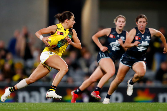 Richmond star Monique Conti in full flight. She completed her first full football pre-season this year.