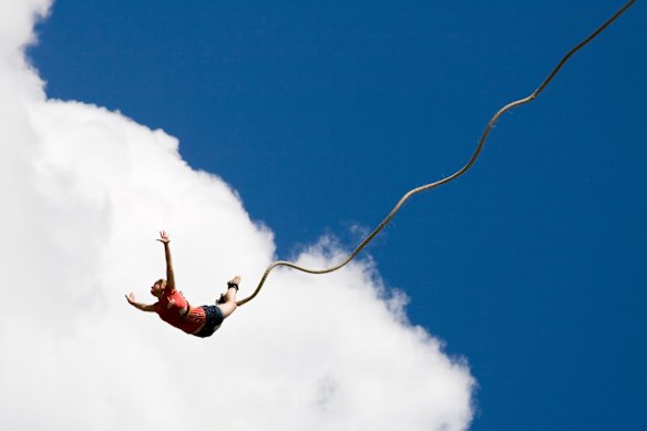 Who dares wins: Travel forces you out of your comfort zone, especially at the end of a bungee cord.