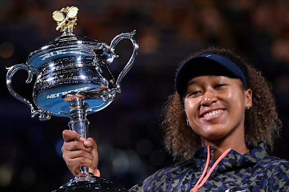 Japan’s Naomi Osaka holds the Daphne Akhurst Memorial Cup after defeating United States Jennifer Brady in the women’s singles final at the 2021 Australian Open tennis championship in Melbourne. 