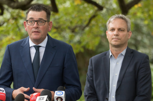 Victorian Premier Daniel Andrews, flanked by Victoria's Chief Health Officer Dr Brett Sutton, predicted a health and economic crisis like the nation had rarely seen.