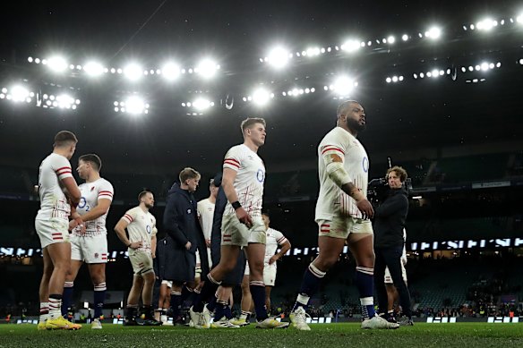 England trudge off Twickenham after losing to the Springboks.