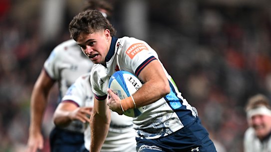 Teddy Wilson on his way to a try against the Crusaders.