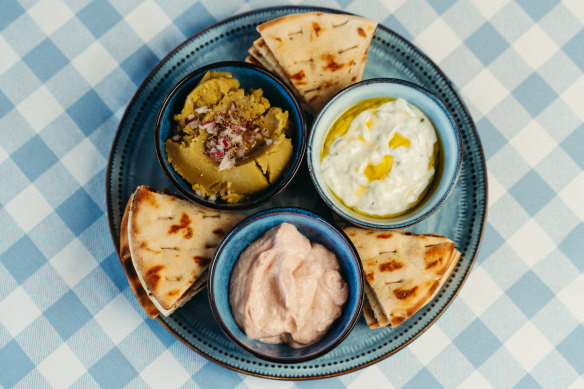 Dips are made in-house and served with fluffy, warm pita bread. 