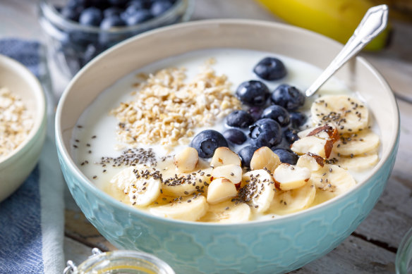 Porridge topped with blueberries, banana, nuts and seeds makes a filling, low-GI breakfast.