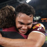 Xavier Coates and Reece Walsh of the Maroons celebrate their 38-10 win.