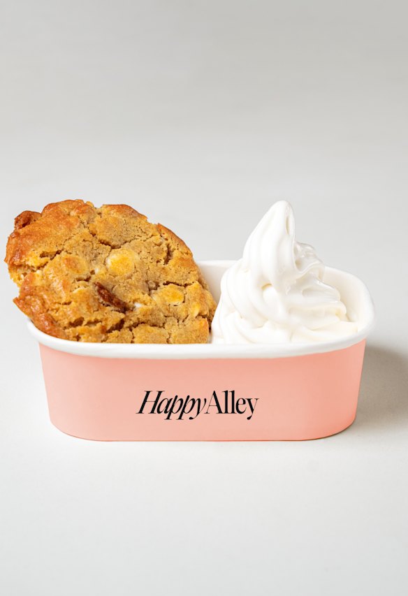 Choc chip cookie with soft-serve ice cream.