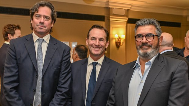 Former AFL CEOs Gillon McLachlan (left) and Andrew Demetriou (right) with current league boss Andrew Dillon at Neil Mitchell’s departure from 3AW Mornings last year.
