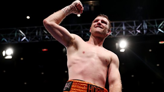 Jeff Horn celebrates winning against Michael Zerafa after their bout in Brisbane.