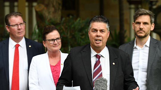 (From left) the Queensland Government Health Committee's Barry O'Rourke, Joan Pease, Aaron Harper, and Michael Berkman at a press conference at Parliament House in Brisbane on Thursday.
