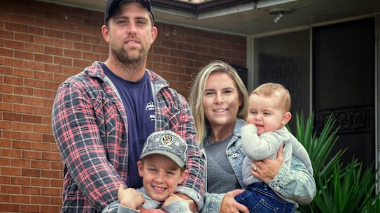 Photo of James Daglish with partner Kimberly Mattuchio and children Carter Daglish and Archi Daglish in front of their newly purchased home in Frankston on Sunday 1 May 2022
