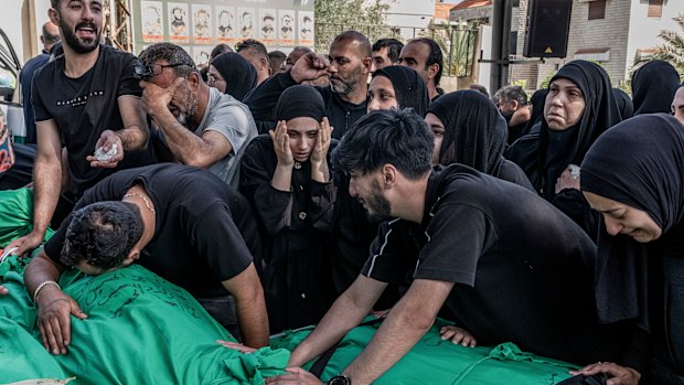 The funeral of eight family members killed in an Israeli strike on southern Lebanon earlier this month.
