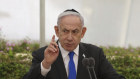 Israeli Prime Minister Benjamin Netanyahu speaks during a ceremony at the Nahalat Yitshak Cemetery in Tel Aviv on Tuesday (Wednesday AEST).