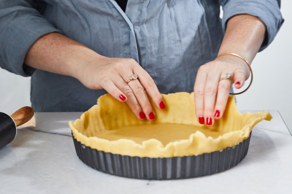 Roll the pastry out to 2-3mm thick before lining the tin. 