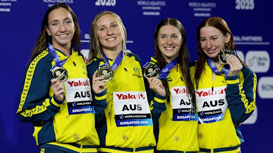 Gold medallists Lani Pallister, Jamie Perkins, Brittany Castelluzzo and Mollie O’Callaghan after winning gold in the women’s 4x200m freestyle relay. 