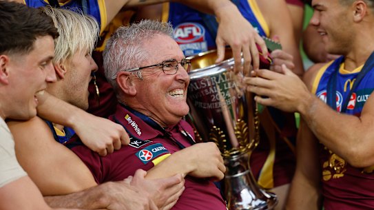 Chris Fagan celebrates with his victorious Lions.