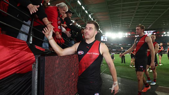 Zach Merrett of the Bombers thanks fans after his club’s win over Sydney.