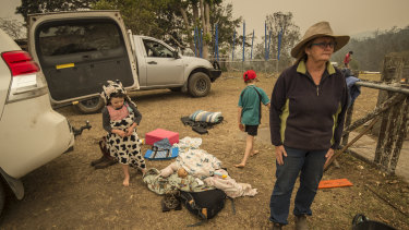Dungay cattle farmer Sue Clarke packing a vehicle ahead of worsening  conditions.
