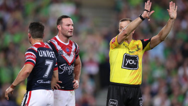 Cooper Cronk is sent to the sin bin after tackling Josh Papalii without the ball.