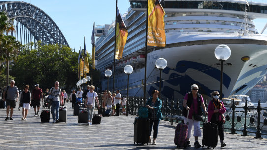 Cruise ship passengers disembark from the Ruby Princess at Circular Quay in Sydney on Thursday, March 19.
