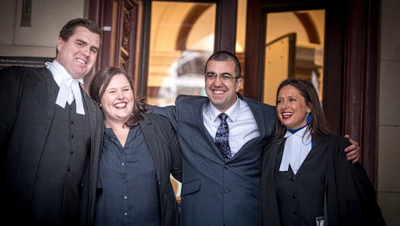Faruk Orman (third from left) on the steps of the Supreme Court with his legal team after his conviction was quashed on Friday.