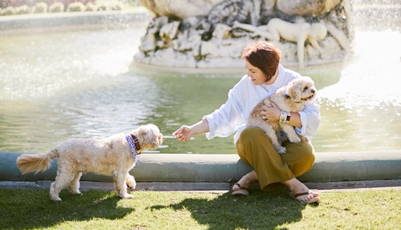 Kimberley Kitching, posing with dogs Ronnie and Nancy-Jane for a 2018 Good Weekend profile. 