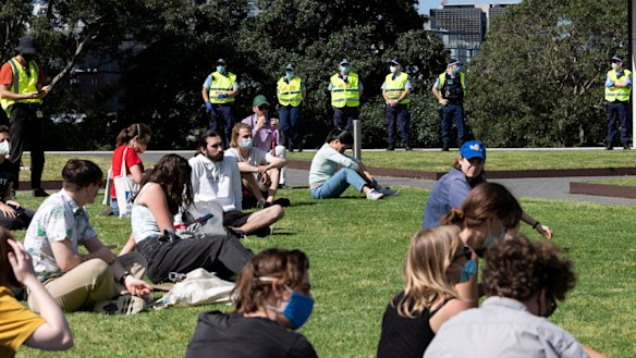Students sitting down in the park were allowed to stay. Those protesting were fined. 