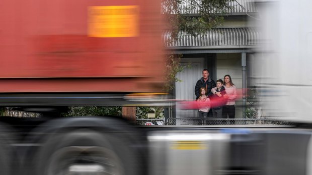 Kathleen and Rob with their children Matt (11) and Georgia (8) live on Williamstown Road in Seddon, they are sick of worsening truck traffic and pollution on their street