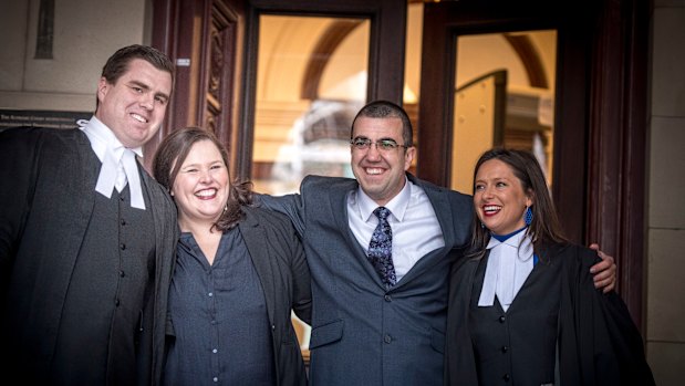 Faruk Orman (third from left) with Ruth Parker (second from left) on the steps of the Supreme Court after his conviction was quashed.