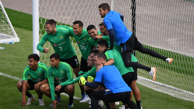 Happy snap: Australia take a moment to capture their World Cup preparations.