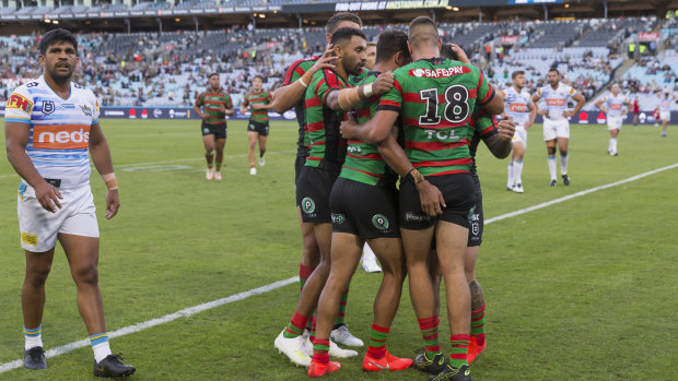 South Sydney celebrate a Corey Allen try in their tighter than expected win over the Gold Coast. 