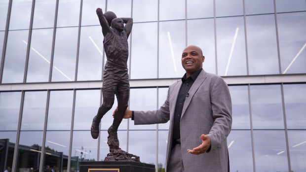 Barkley and his statue in Philadelphia.