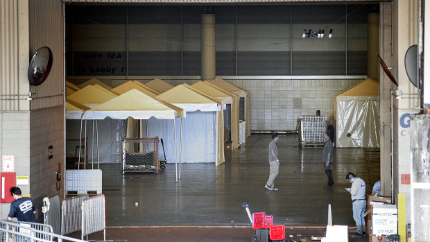 Workers prepare the Ernest N. Morial Convention Centre in New Orleans on Friday.